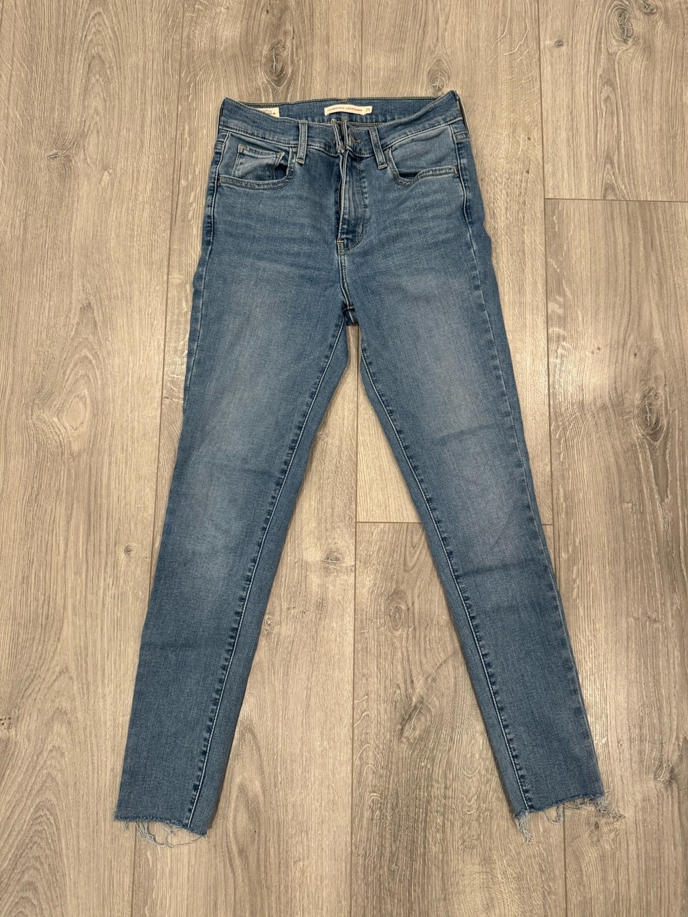 Levi’s light wash 720 high rise super skinny jeans